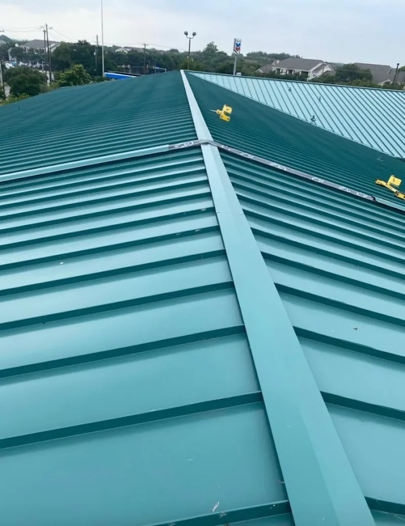 Green commercial metal roof ridge and valley for Metal Roof Repair in Brecknock